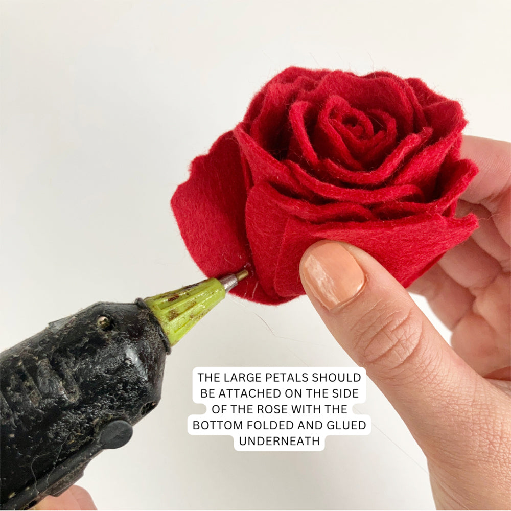 Gluing large petals to side and bottom of large rose