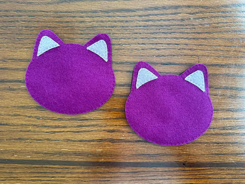 Stitching ears onto cat base