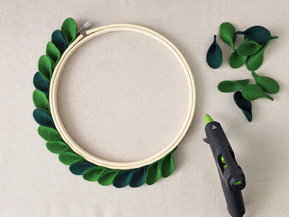 Gluing leaves to outer edge of hoop