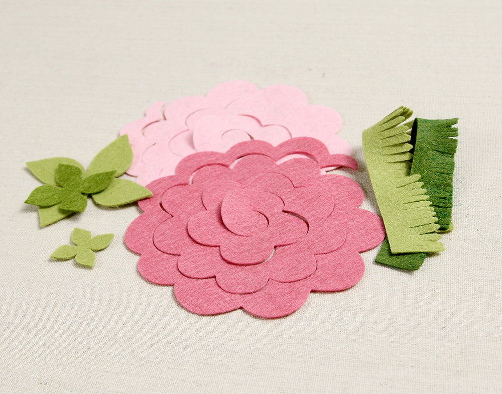 Cutting out felt floral pieces