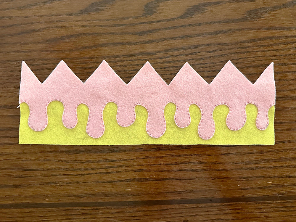 Stitching felt frosting to crown
