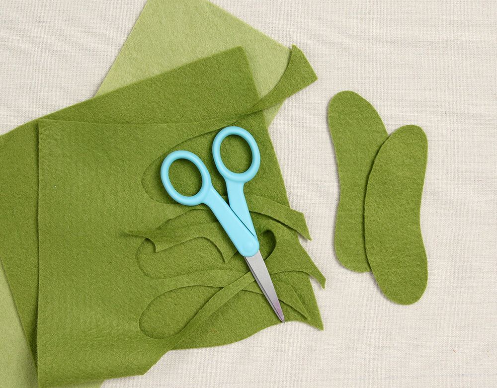 Cutting out felt pattern pieces