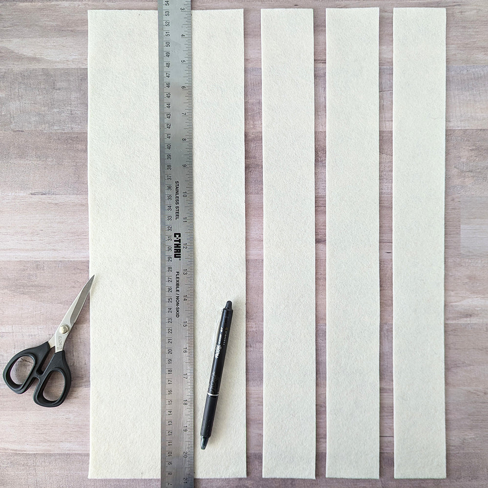Cutting felt strips for domino thickness