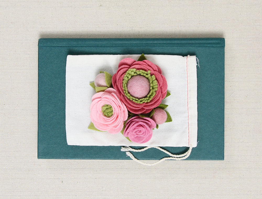 Rolled roses with pom centers