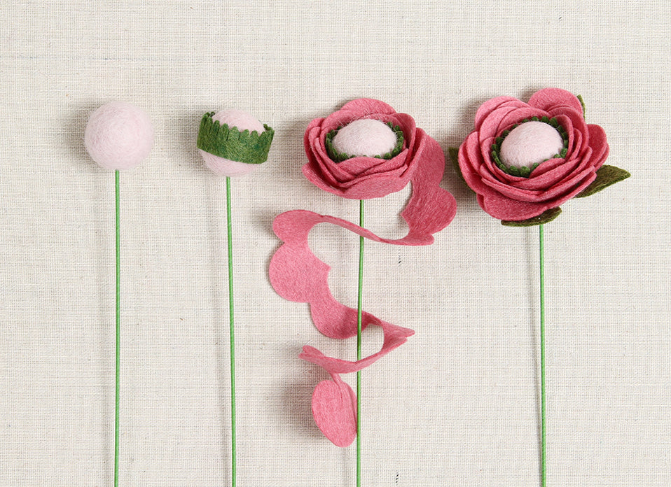 Rolled roses on stems