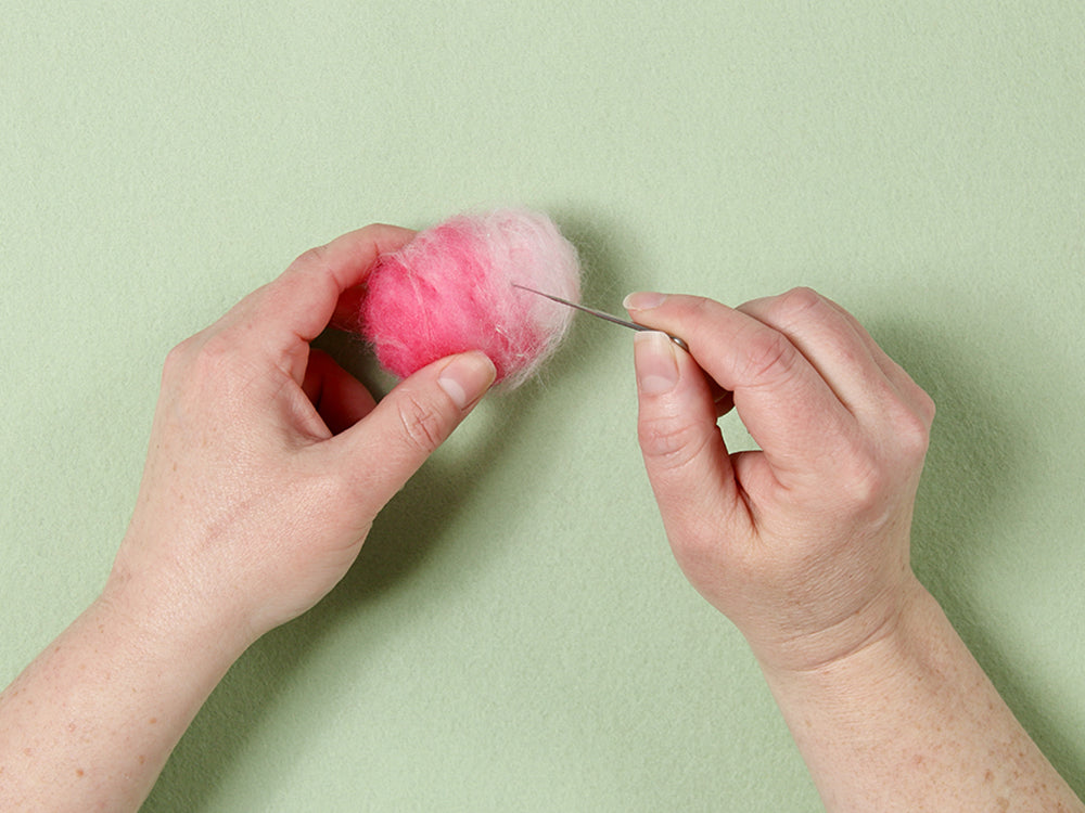 Felting roving into the egg