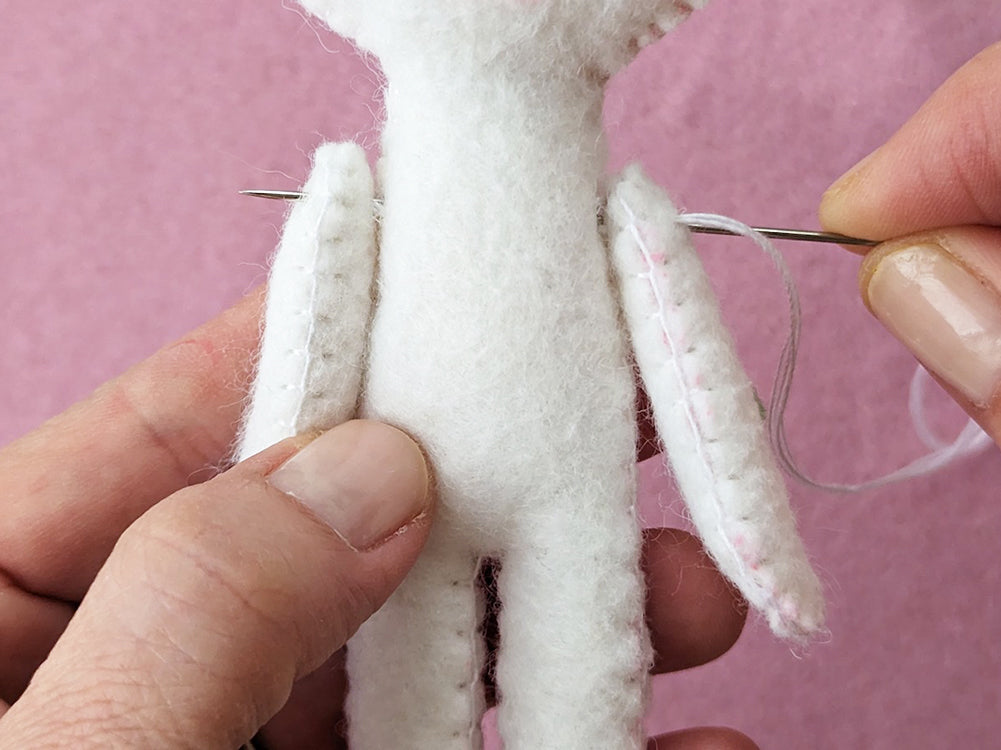 Attaching arms to bunny body