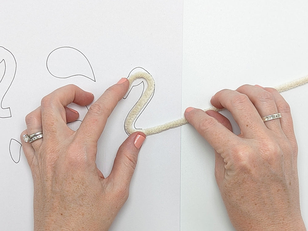 Bending pipe cleaner into shape