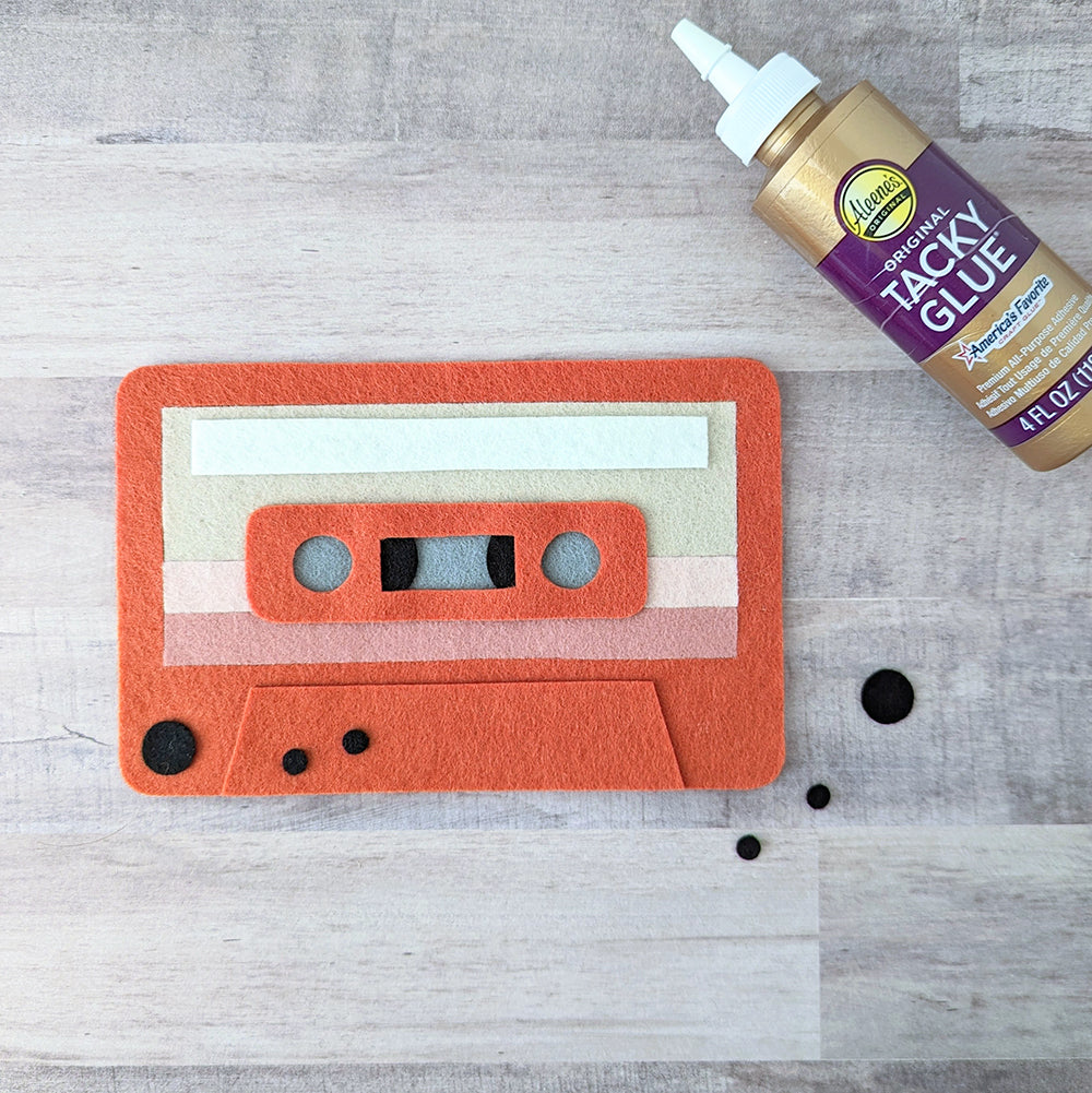 Gluing felt screws onto cassette front