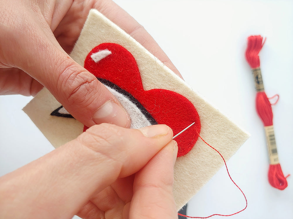 Stitching around red details