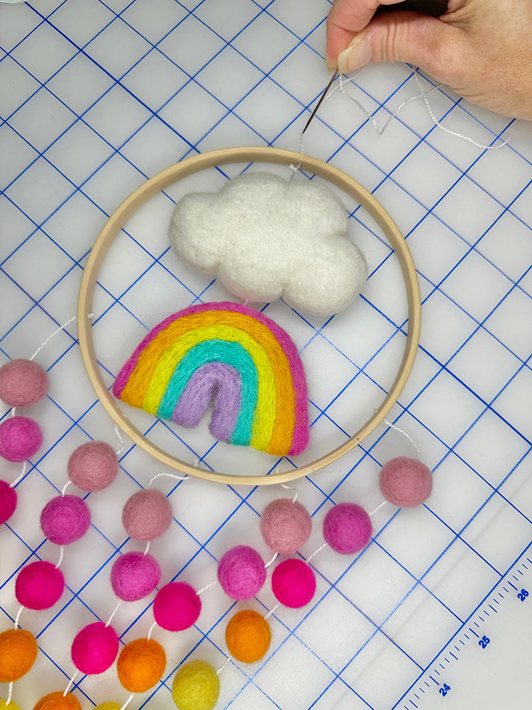 Centering rainbow and cloud strand in hoop