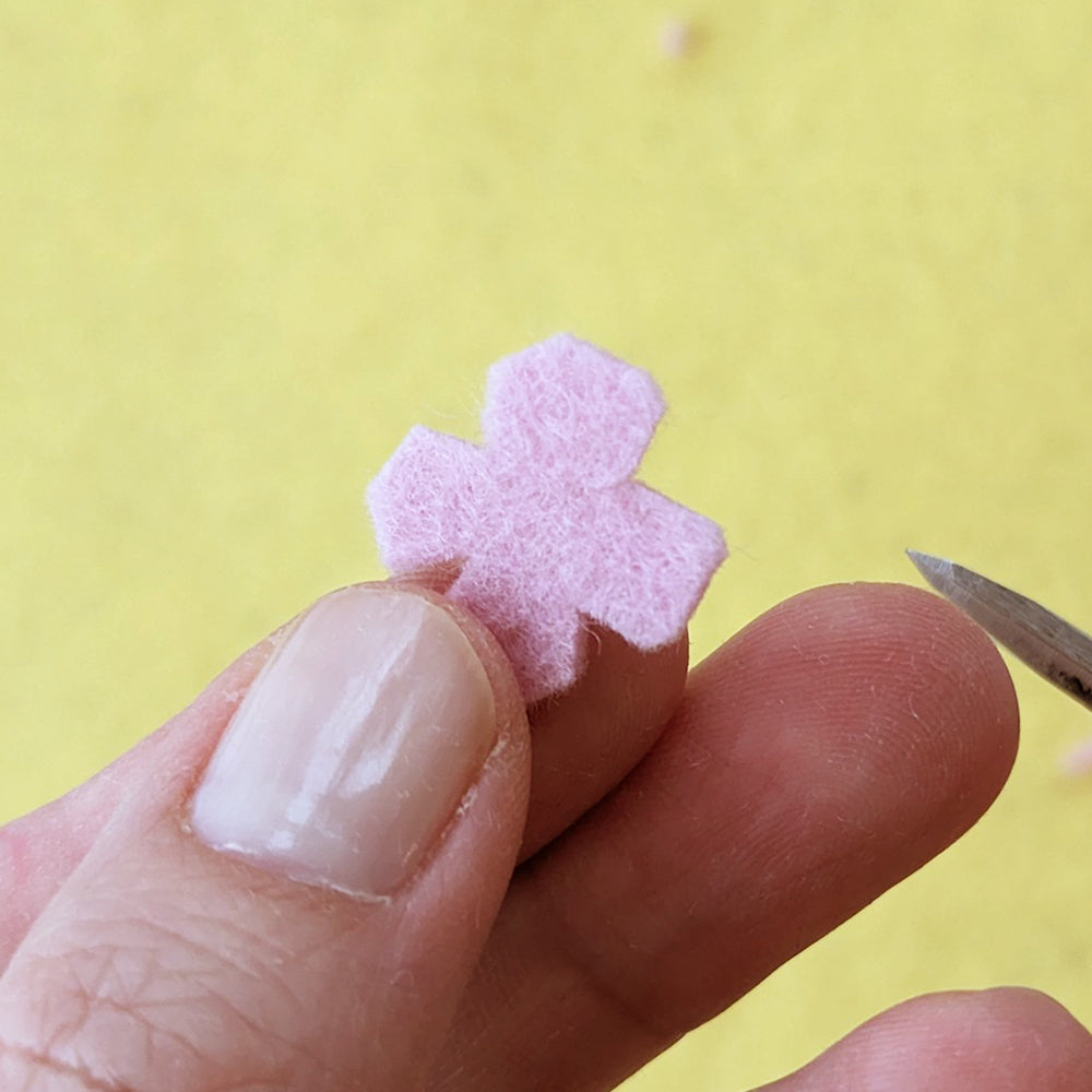 Cutting felt into flower shape