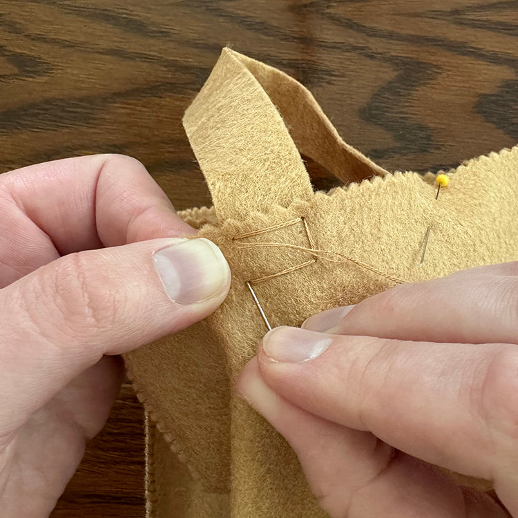 Demonstrating box stitch