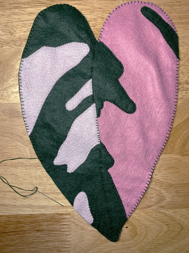 Stitching perimeter of felt leaf