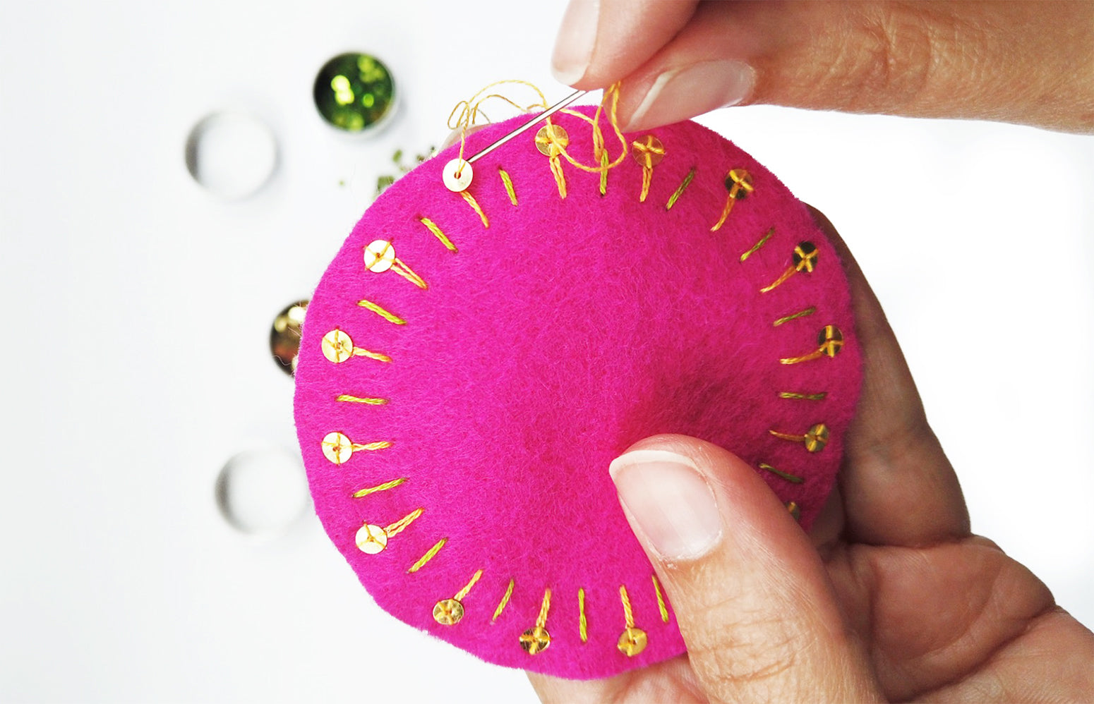 Sewing on sunray sequins