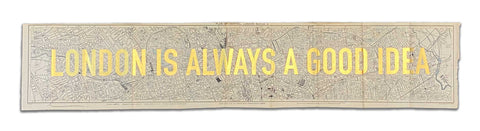 London is always a good idea by artist Dave Buonaguidi. The artwork is a Gold leaf screen Print on a vintage map