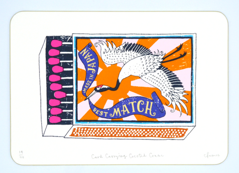 A colourful pink and orange match stick box with a flying crane by artist charlotte farmer