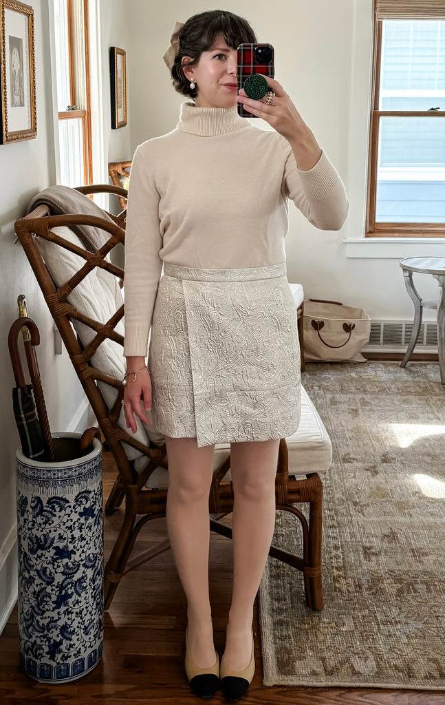 Maria Confer wearing a cream Christmas Holiday outfit look idea