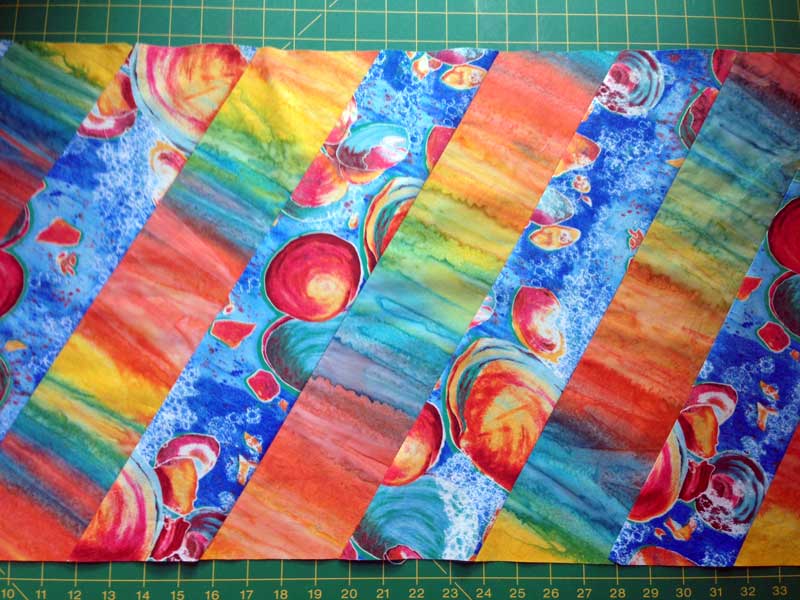 Christine Vinh begins piecing a table runner, inspired by a Kaffe Fassett project