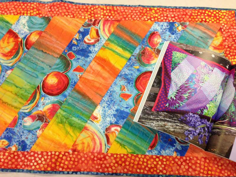 Christine Vinh's table runner and the Kaffe Fassett project that inspired it
