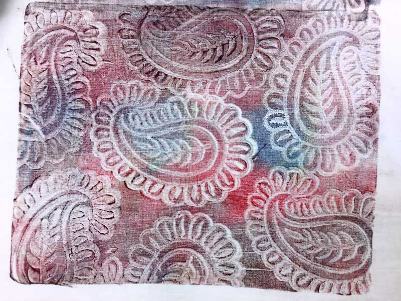 Monoprinted fabric created on a gel printing place with Artistic Artifacts Fluid Textile Paint and wooden printing blocks.