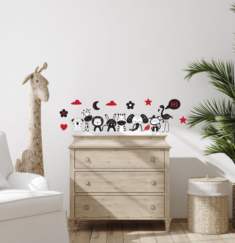 safari sensory textile  wall stickers positioned by a changing table.