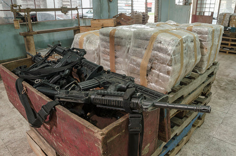 Drugs and crates and rifles, oh my!
