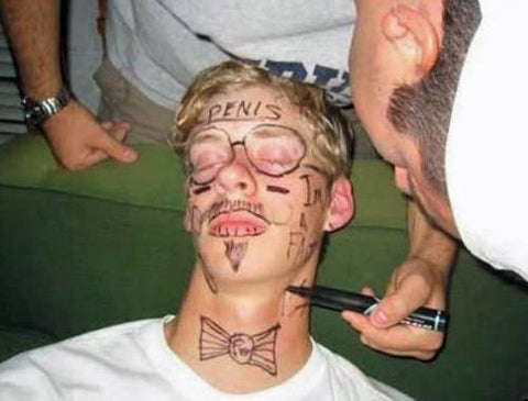 passed-out-college-guy-gets-drawn-on-by-mates-rude-funny.jpg