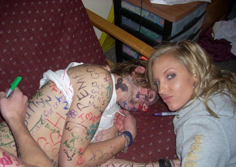 passed-out-guy-covered-in-marker-pen-by-a-girl-prank_large.jpg