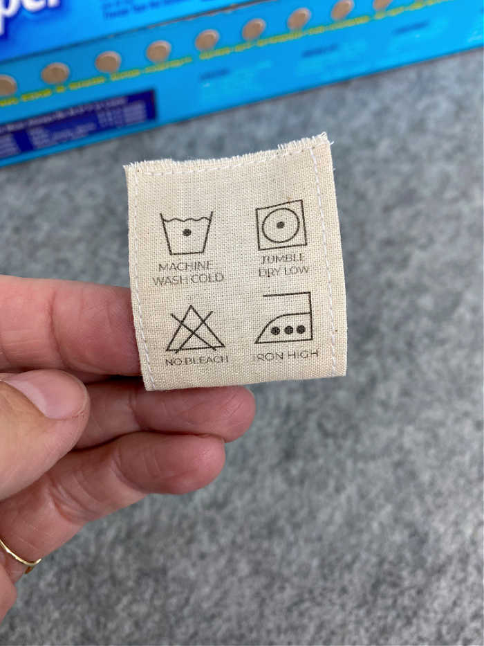 Photo of cotton care label that has been hemmed