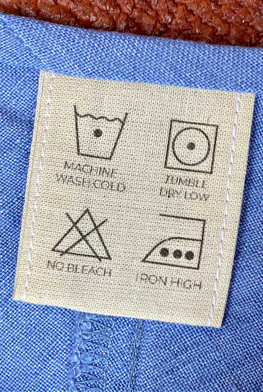 Photo of care labels in cotton top neckline