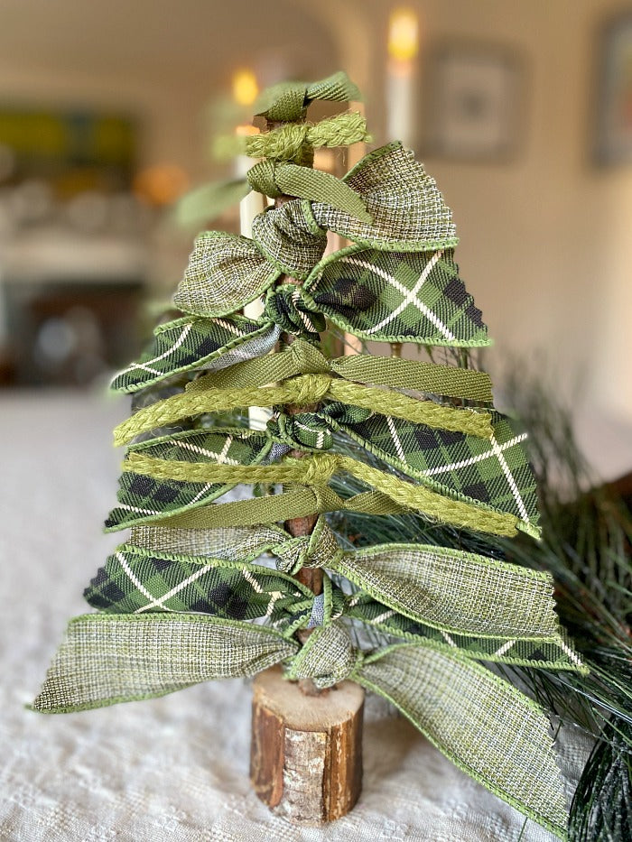 How To Make Festive Holiday Ribbon Trees From Upcycled Materials. This easy diy video shows you how to turn found objects and bin scraps into fun holiday decor. #upcycle #foundobjects #craftsforkids #holidaydecor #holidaydecorating