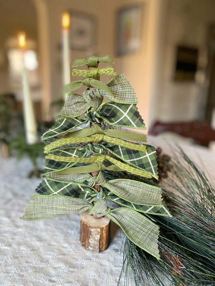 How To Make Festive Holiday Ribbon Trees From Upcycled Materials. This easy diy video shows you how to turn found objects and bin scraps into fun holiday decor. #upcycle #foundobjects #craftsforkids #holidaydecor #holidaydecorating