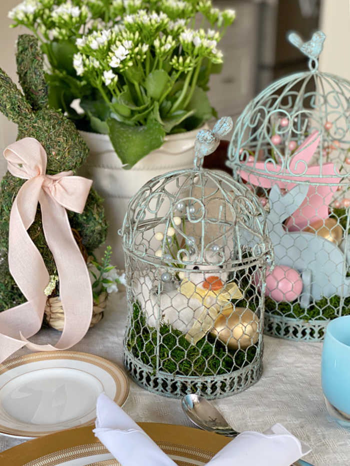 How to style a festive Easter tablescape on a budget. See how I created delightful touches for a fun Easter table to welcome friends and family. #Easter #celebration #hostess #Eastertablescape #tabledesign