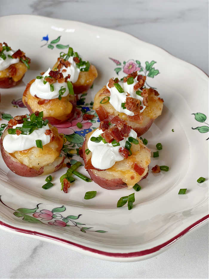 Loaded bacon cheddar twice baked potato bites recipe. This delicious recipe is a lovely way to celebrate St. Patrick's Day in March! #twicebakepotato #stpatricksdayrecipe #potatorecipes
