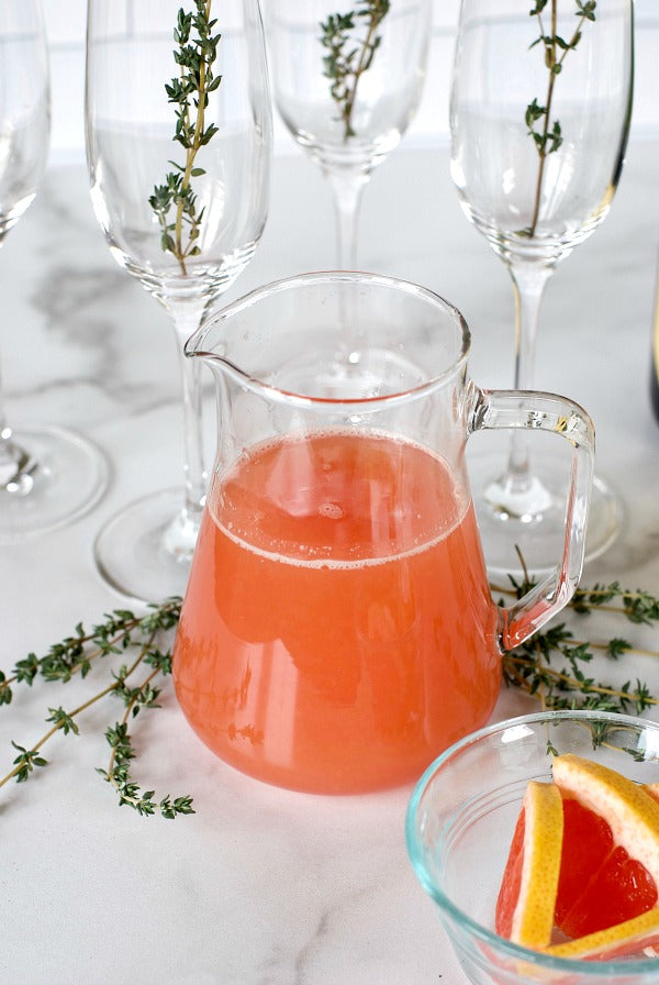 Sparkling hound grapefruit mimosa recipe to serve at your next brunch or lunchtime gathering. Four ingredient cocktail for parties. #mimosa #mimosabar #brunch #brunchrecipes #entertain #satsumadesigns