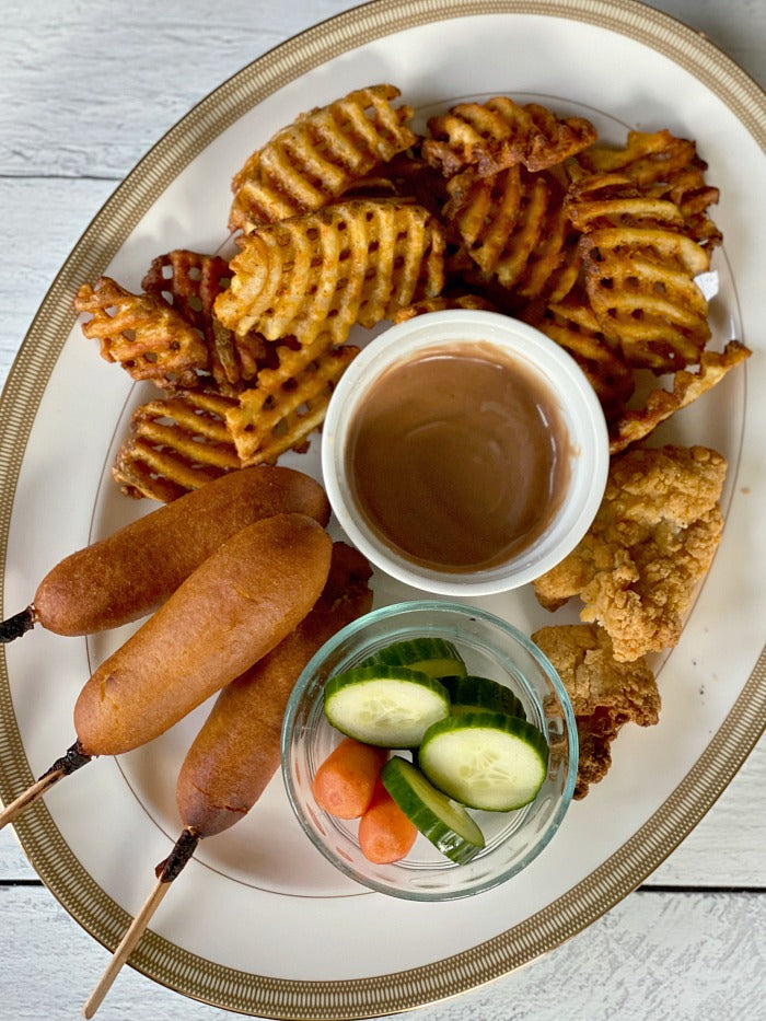 Air fryer kids dinner platter for quick and easy weeknight meals. My air fryer tips will help you help the kids both make dinner and enjoy a balanced dinner with air fryer treats and a tossed green salad. #airfryer #airfryerrecipes #whatsfordinner #kids #kidscook #chef #cook #airfrier #littlechefs #weeknight #mealplanning #dinner #dinnerrecipes #20minutemeals