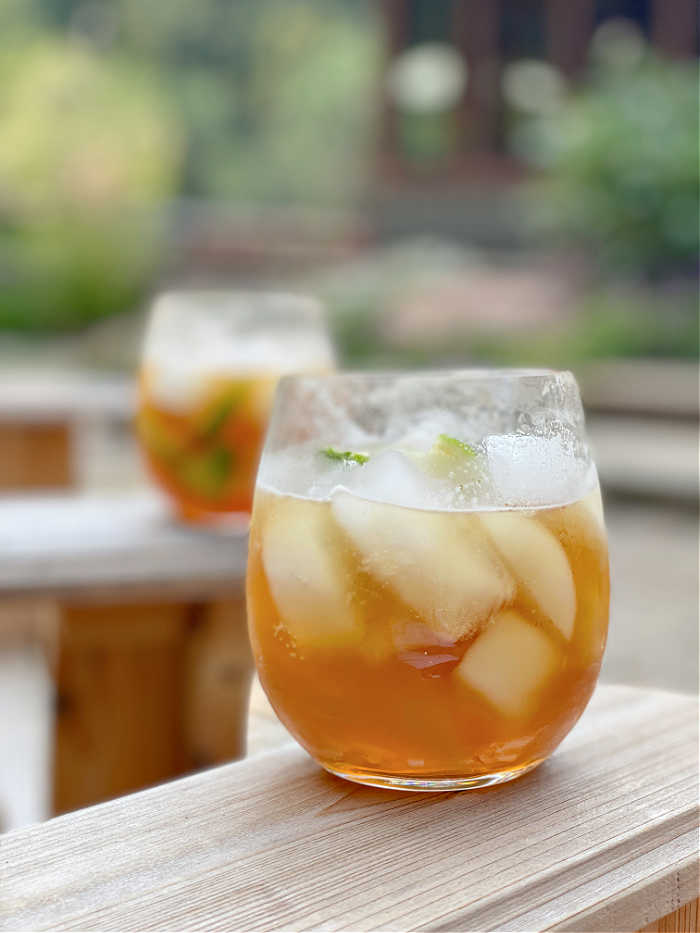 Photo of two dark and stormy cocktails