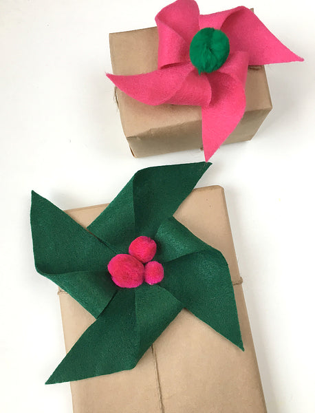 https://cdn.shopify.com/s/files/1/0791/9807/files/diy_felt_pinwheel_gift_toppers_2_600x600.jpg?v=1481233481