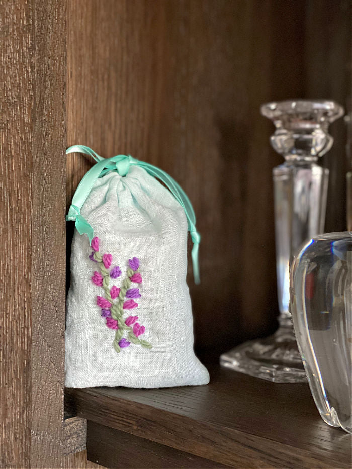 Here's how to make a sweet embroidered lavender sachet. This tutorial on how to sew a drawstring bag is so versatile and easy! #easysewing #sewinglesson #makers #lavender #valentinesdaygifts #crafts