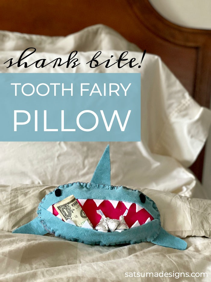 Sew easy shark tooth fairy pillow is the perfect project for little hands. Try this tooth fairy pillow with kids who are learning to sew. Or bypass needle and thread and simply use a glue gun to complete! #toothfairy #kids #sewing #beginnersewing #embroidery #blanketstitch #craft #crafty #crafts #feltcrafts