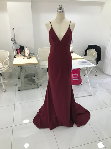 a maroon lady dress on the dummy