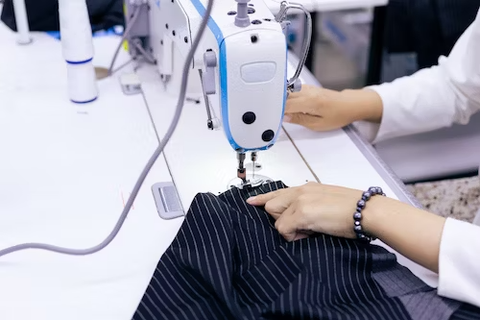 tailor sewing suit