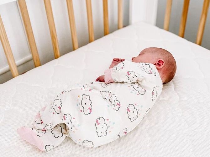 What To Do If Your Baby Is Rolling Over In Their Crib