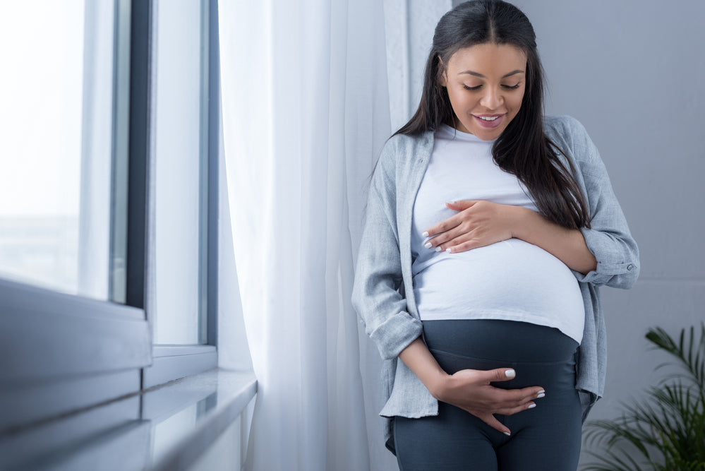 Pregnant Woman Big 9 Month Baby Bump Under White Cloth Stock Image