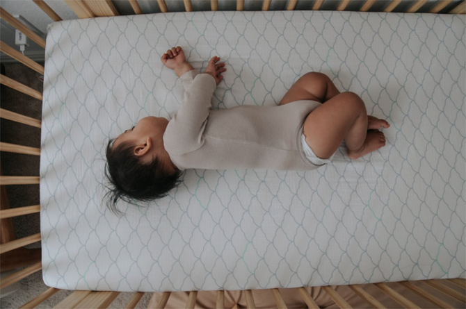 baby sleeping in crib