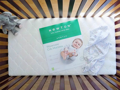 newton baby crib mattress in a crib