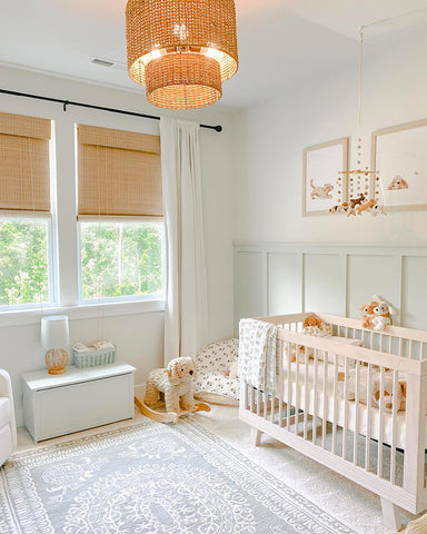 baby boy nursery with statement lighting chandelier 