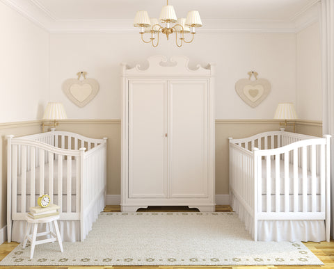 Two cribs for twins in nursery