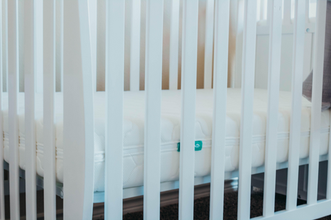 crib safety is important for new crib in nursery